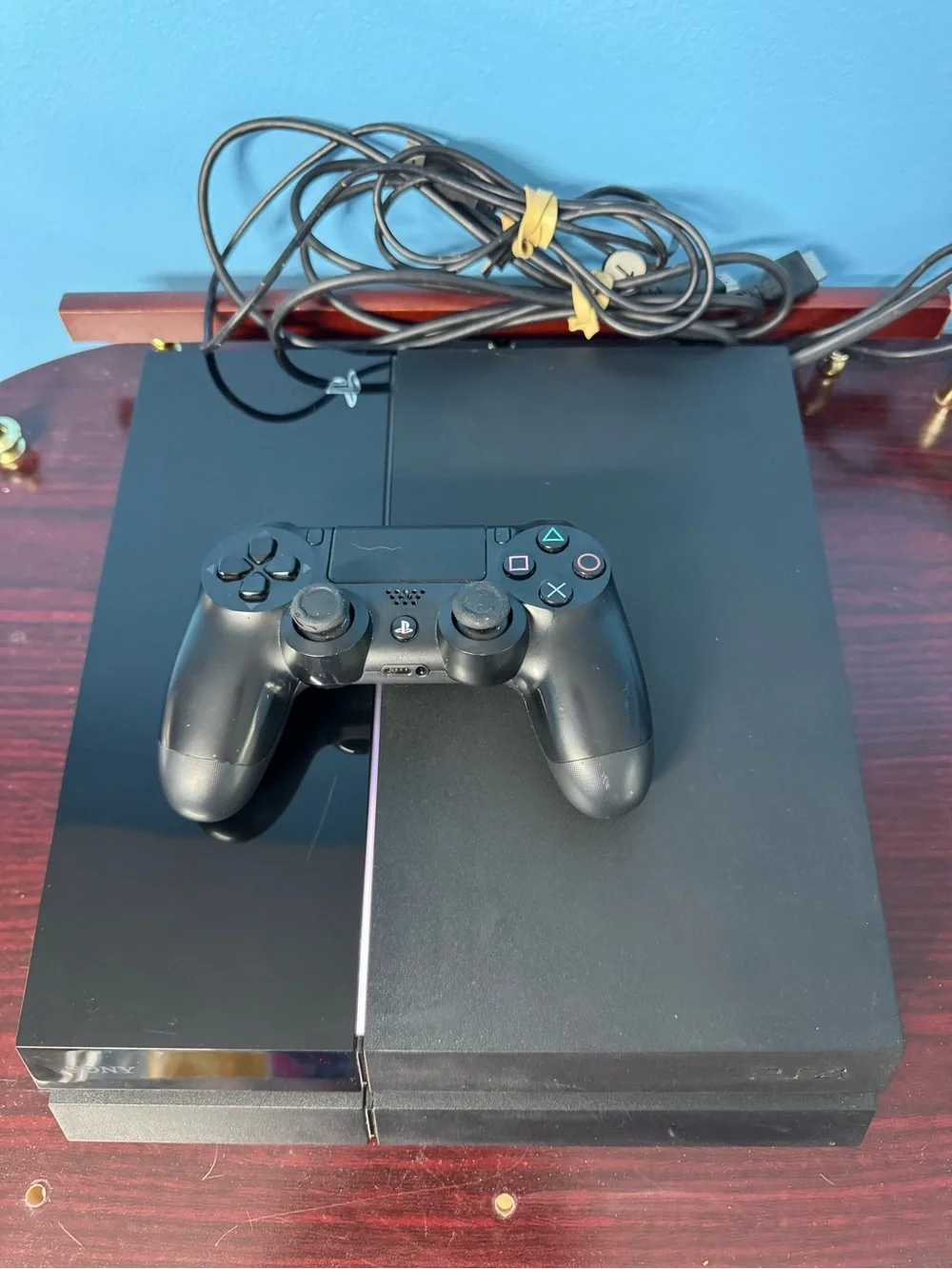 Sony PlayStation 4 Console with Black DualShock Controller